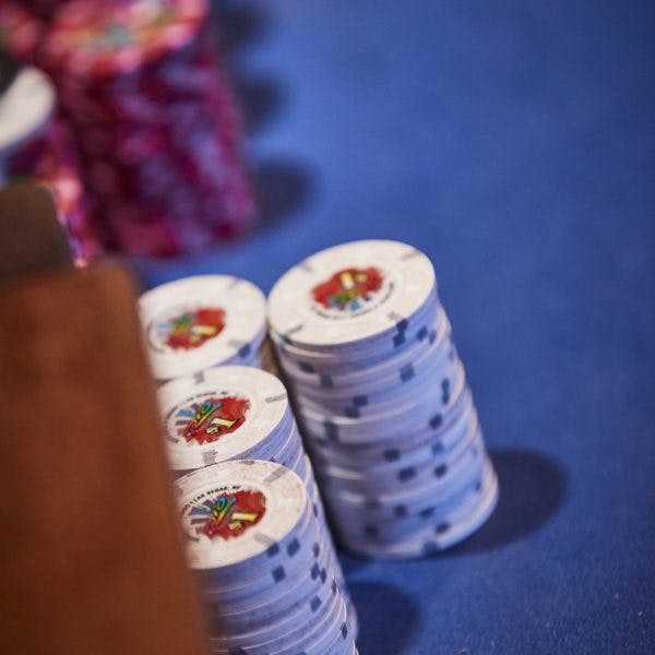 Rio poker chips on a table game in the casino