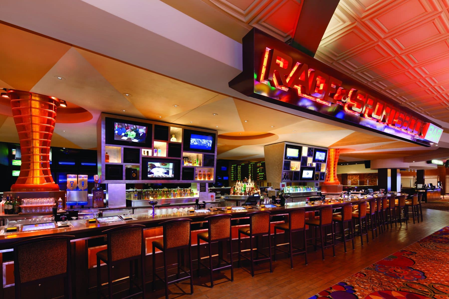 Red Rock Sportsbook bar with neon sign