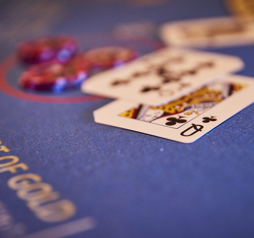 Blackjack game with playing cards for Table Game Players